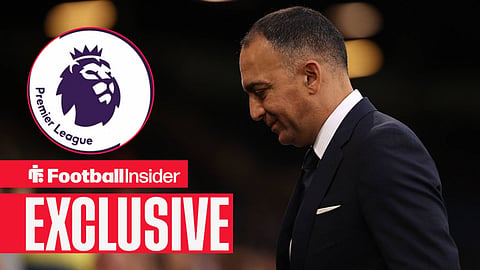 Football Insider exclusive as Leeds chairman Paraag Marathe stares at the floor while the Premier League logo features in a circular inset.