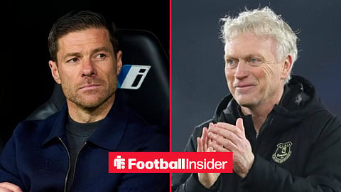 Xabi Alonso looking focused in the dugout, with David Moyes applauding at Everton