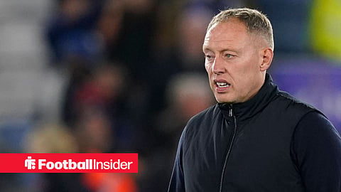 Steve Cooper in black jacket on touchline