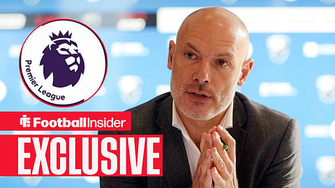 Football Insider exclusive as PGMOL chief Howard Webb stares towards the Premier League logo, which features in a circular inset.