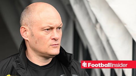 Alex Neil in Millwall jacket and Millwall top