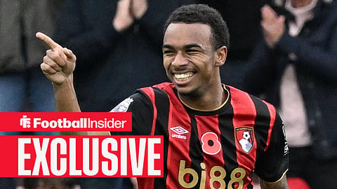 Bournemouth striker Eli Junior Kroupi smiles and points