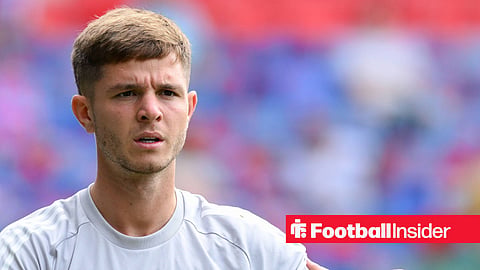 James McAtee warming up for Nottingham Forest in white top