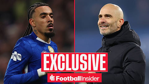 Malo Gusto in action facing Enzo Maresca laughing looking up to stands