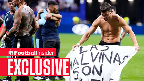 Giovani Lo Celso of Argentina celebrates the victory and holds up a banner during the FIFA World Cup 2026 Semi Final match between England and Argentina at Atlanta Stadium on July 15, 2026