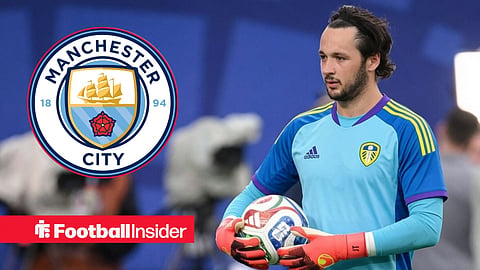 Manchester City's James Trafford in Leeds United's 2026-27 goalkeeper kit / Manchester City badge