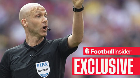 FIFA referee Anthony Taylor in the middle of the pitch in 2022
