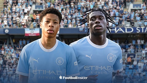 Mishel Nduka, formerly of Arsenal, and Jeremy Monga, signed from Leicester City, in Manchester City kits at the Etihad Stadium