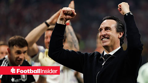 Unai Emery celebrating in black jacket