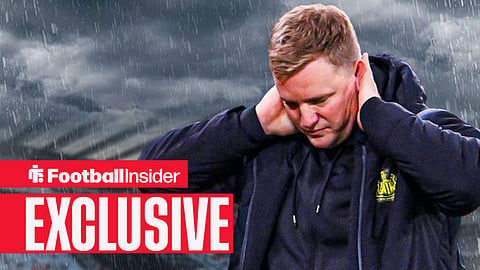 Eddie Howe looking disappointed at a rainy St James' Park