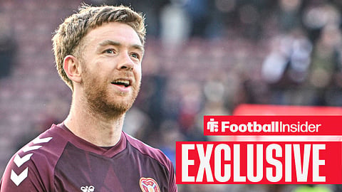 Stuart Findlay of Heart of Midlothian celebrates his sides win at full time during the William Hill Premiership match at Tynecastle Park, Edinburgh