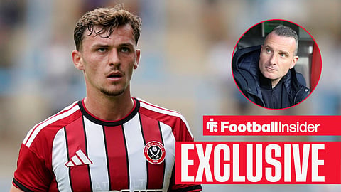 Harrison Burrows in action for Sheffield United with Nicky Hayen sat on bench right inset
