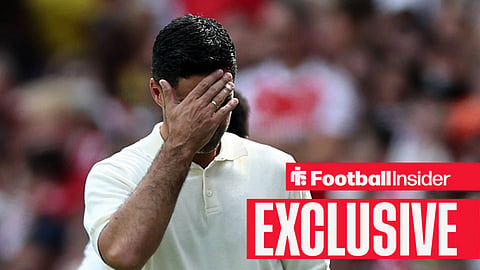 Arsenal manager Mikel Arteta covers his face