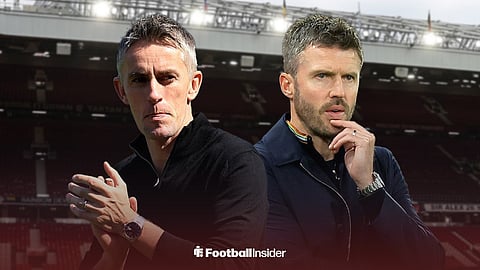 Kieran McKenna and Michael Carrick standing in front of Old Trafford