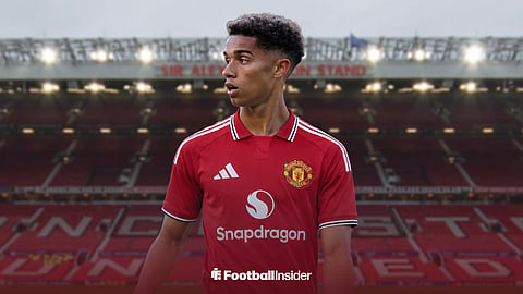 Fulham's Josh King wearing a Man United 26-27 home shirt at Old Trafford