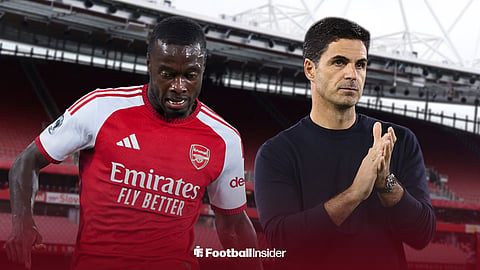 Arsenal's 2019 record signing Nicolas Pepe standing next to Mikel Arteta at the Emirates Stadium