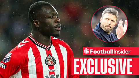 Brian Brobbey in action with Michael Carrick clapping fans right inset