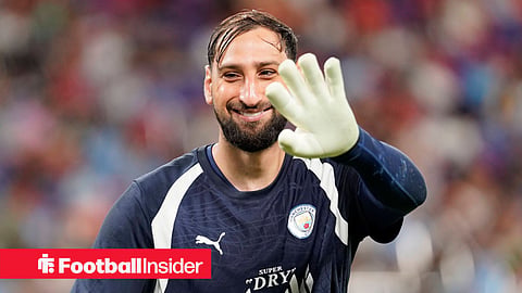 Man City goalkeeper Gianluigi Donnarumma smiles and waves