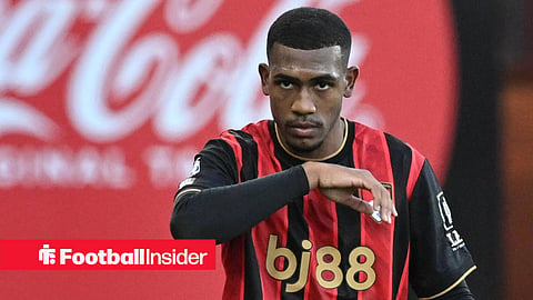 Rayan putting arm to face in action for Bournemouth