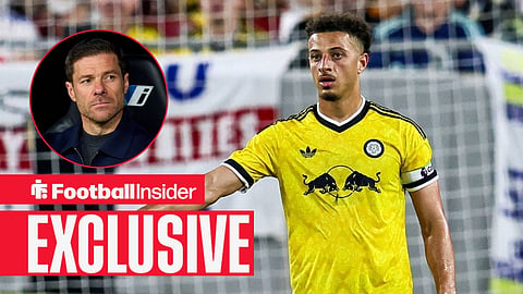 Football Insider exclusive as Leeds midfielder Ethan Ampadu is in action, while Chelsea manager Xabi Alonso watches from a circular inset.