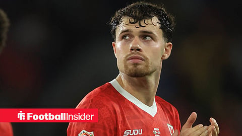 Neco Williams clapping fans after Wales game