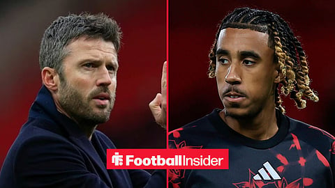 Michael Carrick on the sidelines, with Leny Yoro in action for Man United