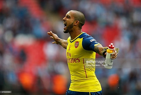 Theo Walcott agrees new Arsenal contract