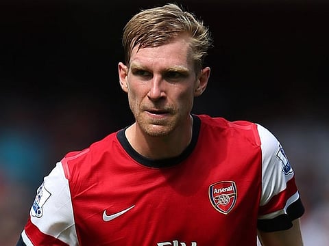 Slowing down: Per Mertesacker's lack of mobility is a growing concern