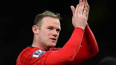 Warm words: Wayne Rooney was full of praise for new team-mate Anthony Martial