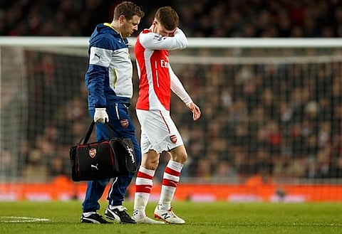 Injury blow: Ramsey suffered a thigh tear earlier this month