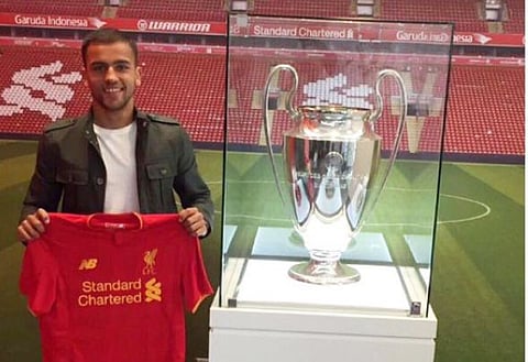Left-back claims on Twitter that he has signed for Liverpool