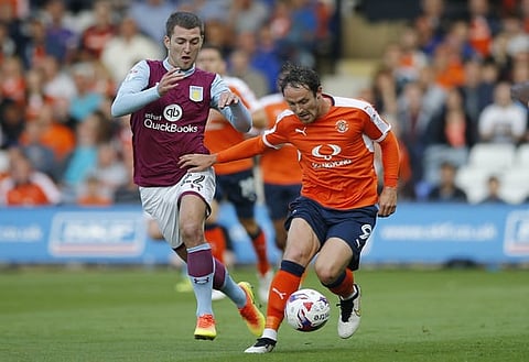 Britain Football Soccer - Luton Town v Aston Villa - EFL Cup First Round - Kenilworth Road - 10/8/16
Luton Town's Danny Hylton and Aston Villas Gary Gardner in action
Mandatory Credit: Action Images / Andrew Couldridge
Livepic