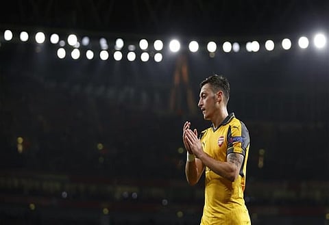 Arsenal fans react on Twitter to bizarre incident involving travelling fans
