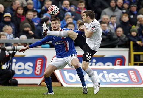 Football Soccer - Carlisle United v Everton - FA Cup Fourth Round - Brunton Park - 31/1/16 
Carlisle United's Macaulay Gillesphey in action with Everton's Seamus Coleman 
Reuters / Phil Noble 
Livepic 
EDITORIAL USE ONLY. No use with unauthorized audio, video, data, fixture lists, club/league logos or "live" services. Online in-match use limited to 45 images, no video emulation. No use in betting, games or single club/league/player publications.  Please contact your account representative for further details.