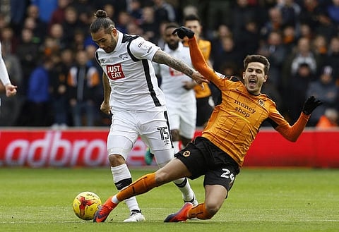 Britain Football Soccer - Wolverhampton Wanderers v Derby County - Sky Bet Championship - Molineux - 5/11/16 Derby County's Bradley Johnson (L) in action with Wolves' Joao Teixeira Mandatory Credit: Action Images / Craig Brough Livepic EDITORIAL USE ONLY. No use with unauthorized audio, video, data, fixture lists, club/league logos or "live" services. Online in-match use limited to 45 images, no video emulation. No use in betting, games or single club/league/player publications.  Please contact your account representative for further details.