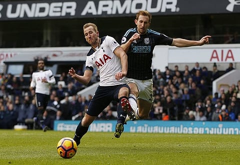 Britain Football Soccer - Tottenham Hotspur v West Bromwich Albion - Premier League - White Hart Lane - 14/1/17 Tottenham's Harry Kane in action with West Bromwich Albion's Craig Dawson  Action Images via Reuters / Paul Childs Livepic EDITORIAL USE ONLY. No use with unauthorized audio, video, data, fixture lists, club/league logos or "live" services. Online in-match use limited to 45 images, no video emulation. No use in betting, games or single club/league/player publications. Please contact your account representative for further details.