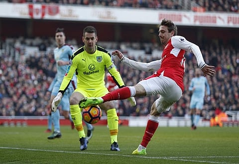 Football Soccer Britain - Arsenal v Burnley - Premier League - Emirates Stadium - 22/1/17 Arsenal's Nacho Monreal in action with Burnley's Tom Heaton  Action Images via Reuters / John Sibley Livepic EDITORIAL USE ONLY. No use with unauthorized audio, video, data, fixture lists, club/league logos or "live" services. Online in-match use limited to 45 images, no video emulation. No use in betting, games or single club/league/player publications.  Please contact your account representative for further details.
