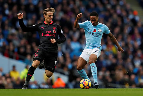 Soccer Football - Premier League - Manchester City vs Arsenal - Etihad Stadium, Manchester, Britain - November 5, 2017   Manchester City's Raheem Sterling in action with Arsenal's Nacho Monreal    Action Images via Reuters/Lee Smith  EDITORIAL USE ONLY. No use with unauthorized audio, video, data, fixture lists, club/league logos or "live" services. Online in-match use limited to 75 images, no video emulation. No use in betting, games or single club/league/player publications. Please contact your account representative for further details.