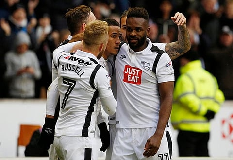 Britain Football Soccer - Wolverhampton Wanderers v Derby County - Sky Bet Championship - Molineux - 5/11/16 Derby County's Thomas Ince celebrates with team mates after he scores his sides third goal Mandatory Credit: Action Images / Craig Brough Livepic EDITORIAL USE ONLY. No use with unauthorized audio, video, data, fixture lists, club/league logos or "live" services. Online in-match use limited to 45 images, no video emulation. No use in betting, games or single club/league/player publications.  Please contact your account representative for further details.