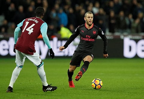 Soccer Football - Premier League - West Ham United vs Arsenal - London Stadium, London, Britain - December 13, 2017   Arsenal's Jack Wilshere in action with West Ham United's Pedro Obiang     REUTERS/David Klein    EDITORIAL USE ONLY. No use with unauthorized audio, video, data, fixture lists, club/league logos or "live" services. Online in-match use limited to 75 images, no video emulation. No use in betting, games or single club/league/player publications.  Please contact your account representative for further details.