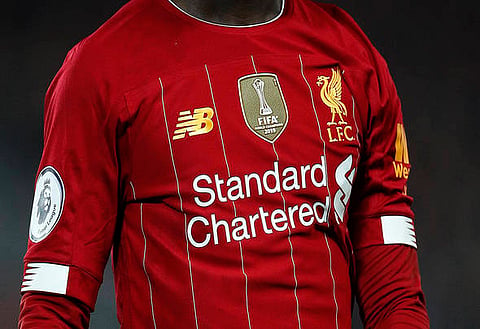 Standard Chartered 'absolutely delighted' with £40m-a-yr Liverpool deal - Maguire