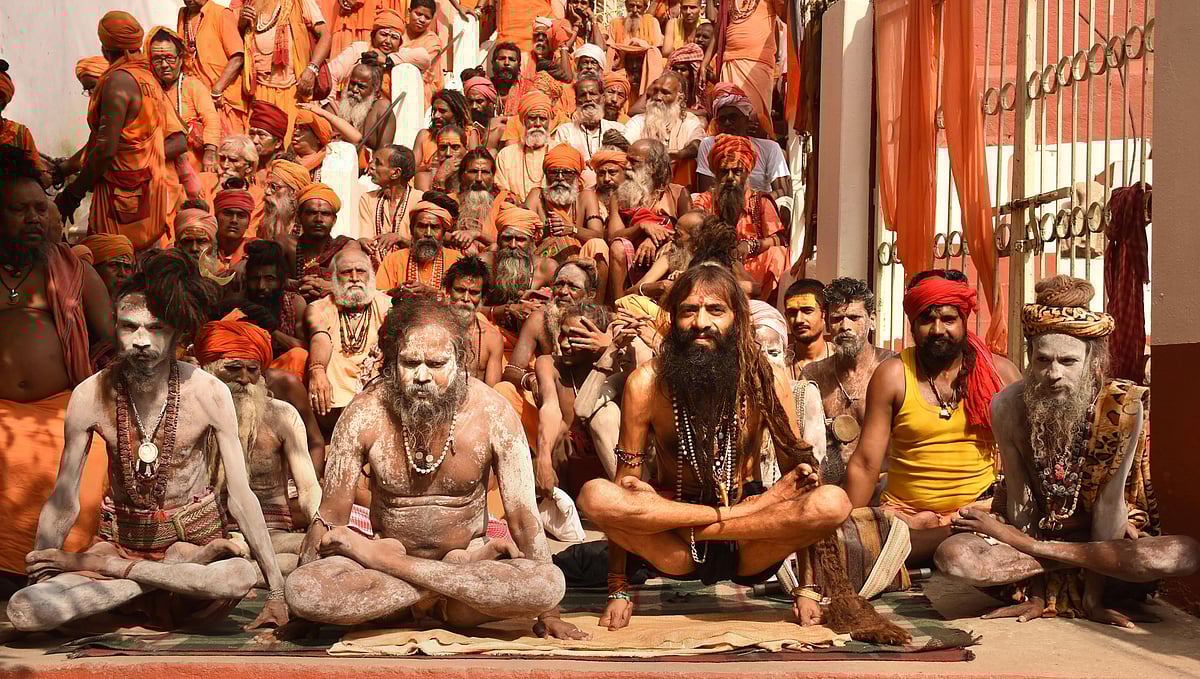 Sadhus perform yoga at Kamakhya Temple to mark the 5th International Day of Yoga, in Guwahati.