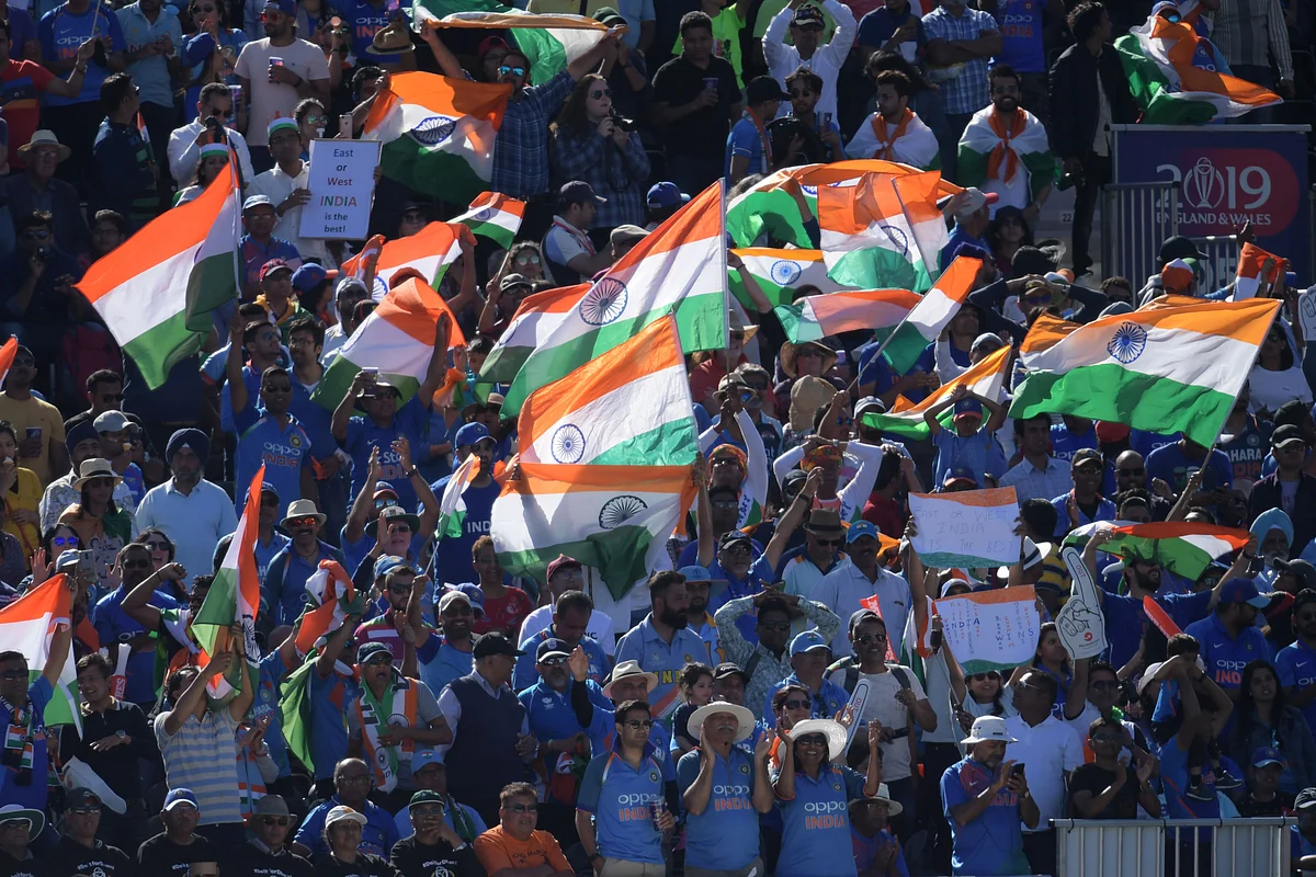 India's supporters cheer during the 2019 Cricket World Cup group stage match between West Indies and India.