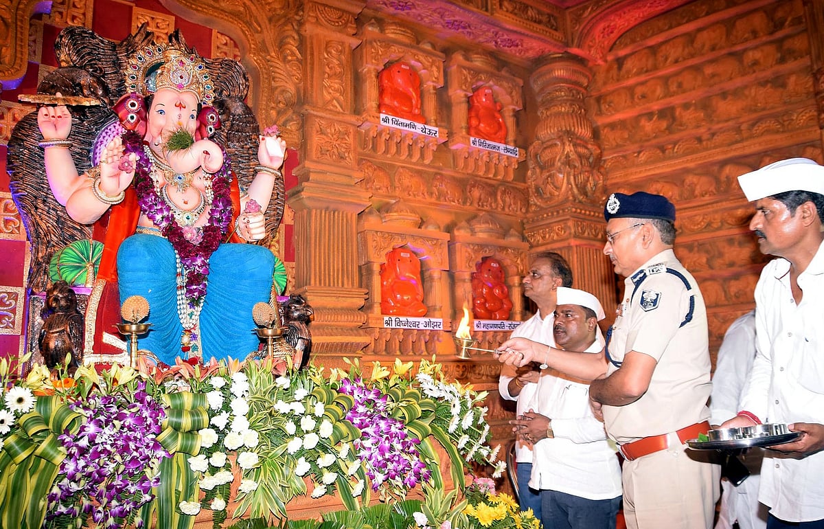 Bihar DGP Gupteshwar Pandey offers prayers to Lord Ganesha on the occasion of the 'Ganesh Chaturthi' festival at Maharastra Mandal in Patna