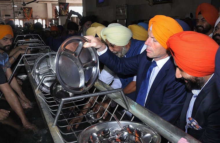 Former Australian PM Tony Abbott visits Golden Temple in Amritsar, partakes langar