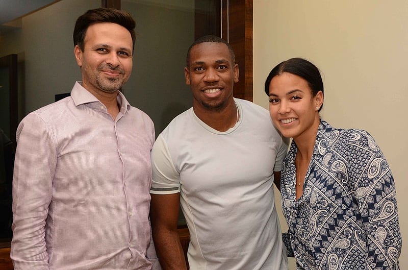 Abhishek Karnani with Yohan Blake and Laura Person