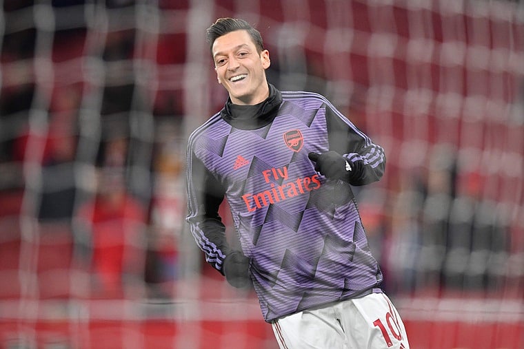 Arsenal faces heat over Mesut Ozil's critical comments on Uighur plight; China state TV pulls team's...