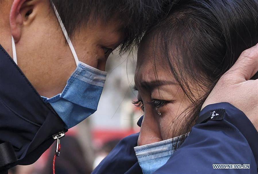 Chinese people unite to fight virus battle
