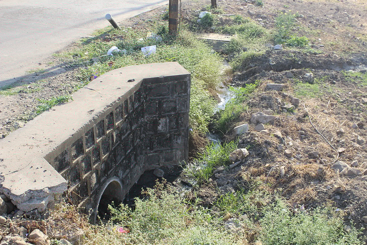 Connection of open sewage made on opposite side of road