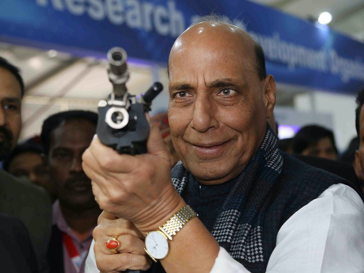 Defence Minister Rajnath Singh at a virtual firing range on display at the Defence Expo